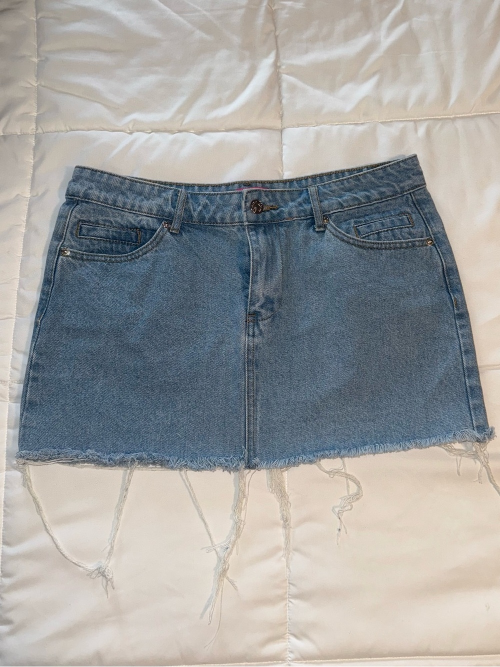 Edikted Light Blue Denim Mini Skirt with Frayed Hem
